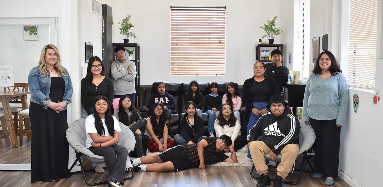 Teens engaging with futuristic technology